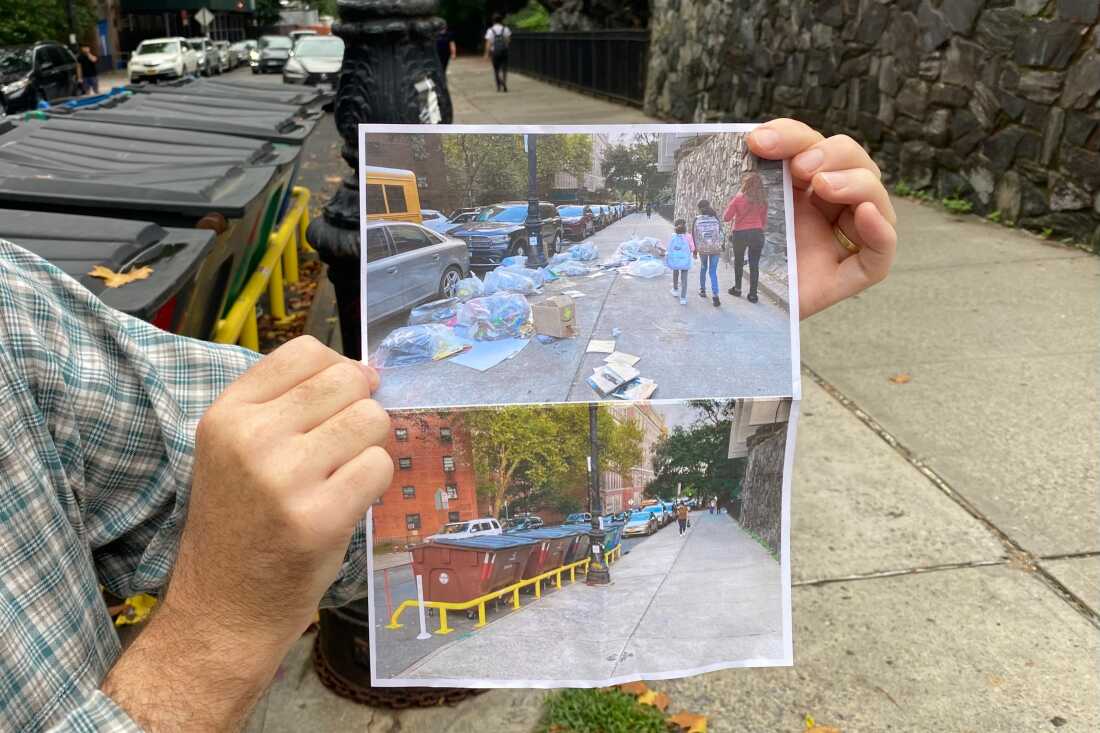 去年 9 月，该市在西哈莱姆区启动了一项试点项目，人们将垃圾倒入路边的大型固定容器中。住在该地区的卡尔·马哈尼手里拿着一张纸，上面是试点垃圾箱安装前后人行道的照片。