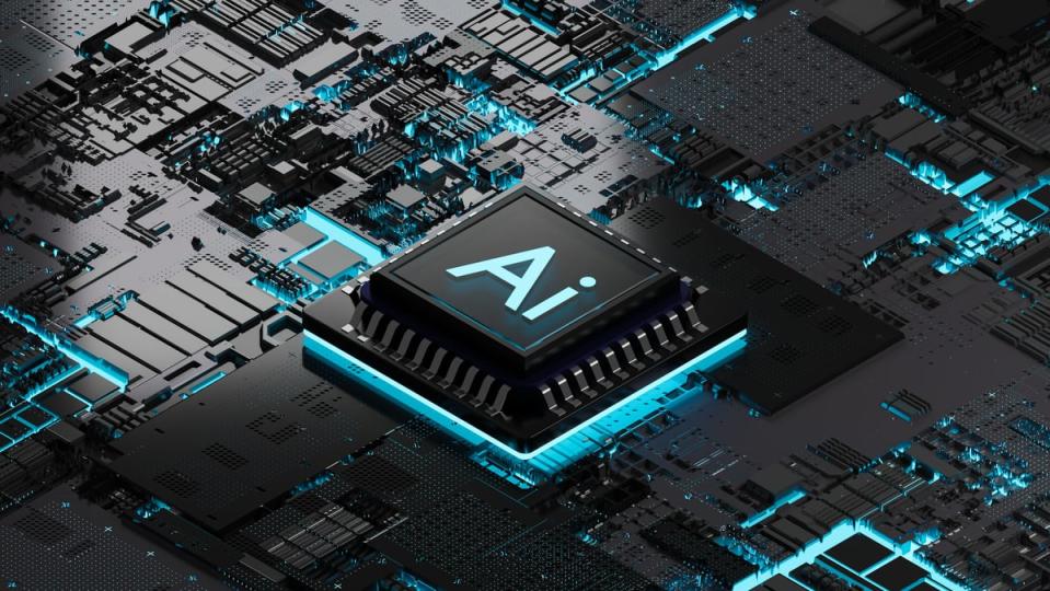 黑色和青色主板上的黑色和青色 AI 芯片。